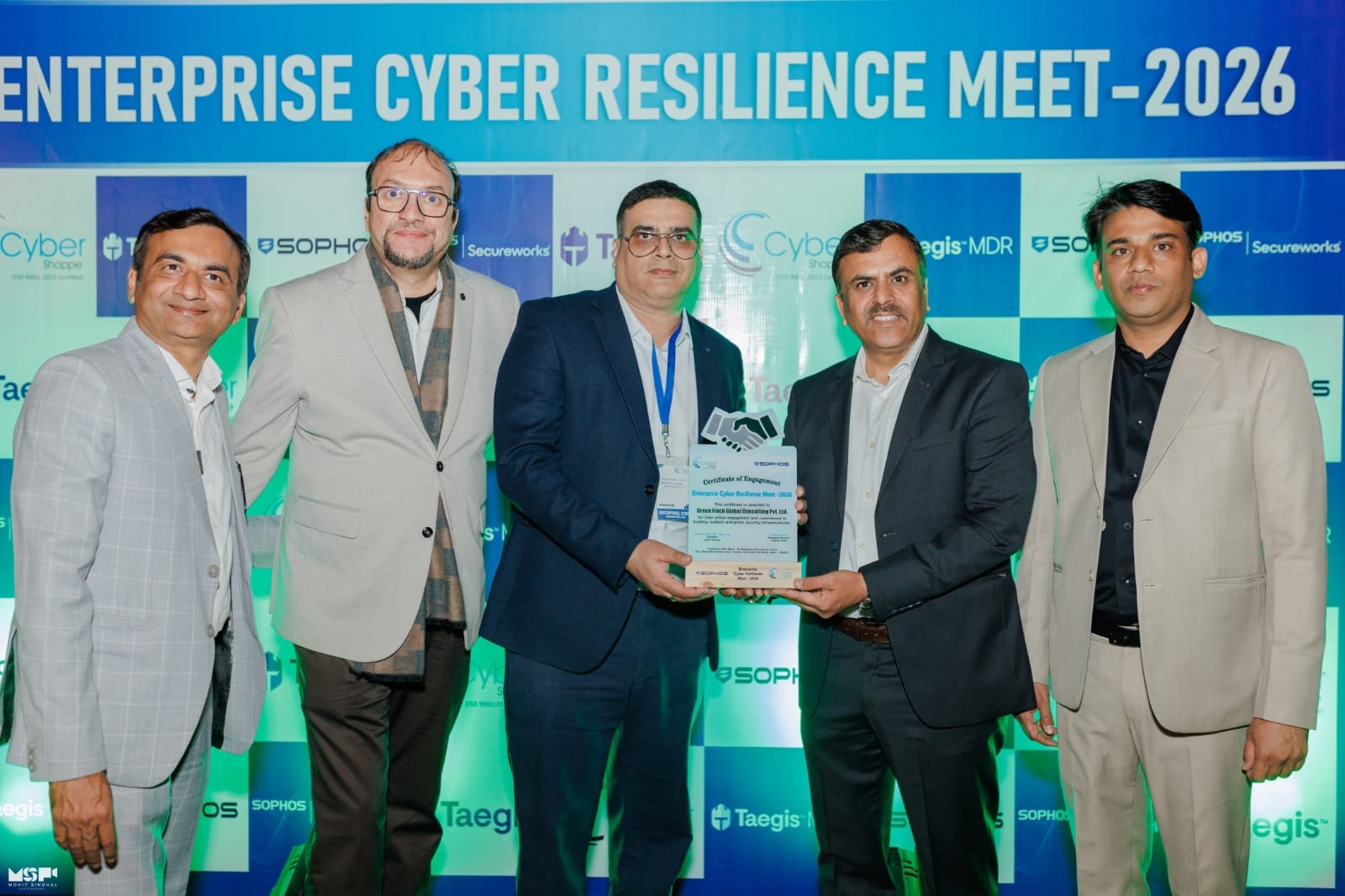 A certificate of engagement being presented to Green Finch Global Consulting at the Enterprise Cyber Resilience Meet 2026.