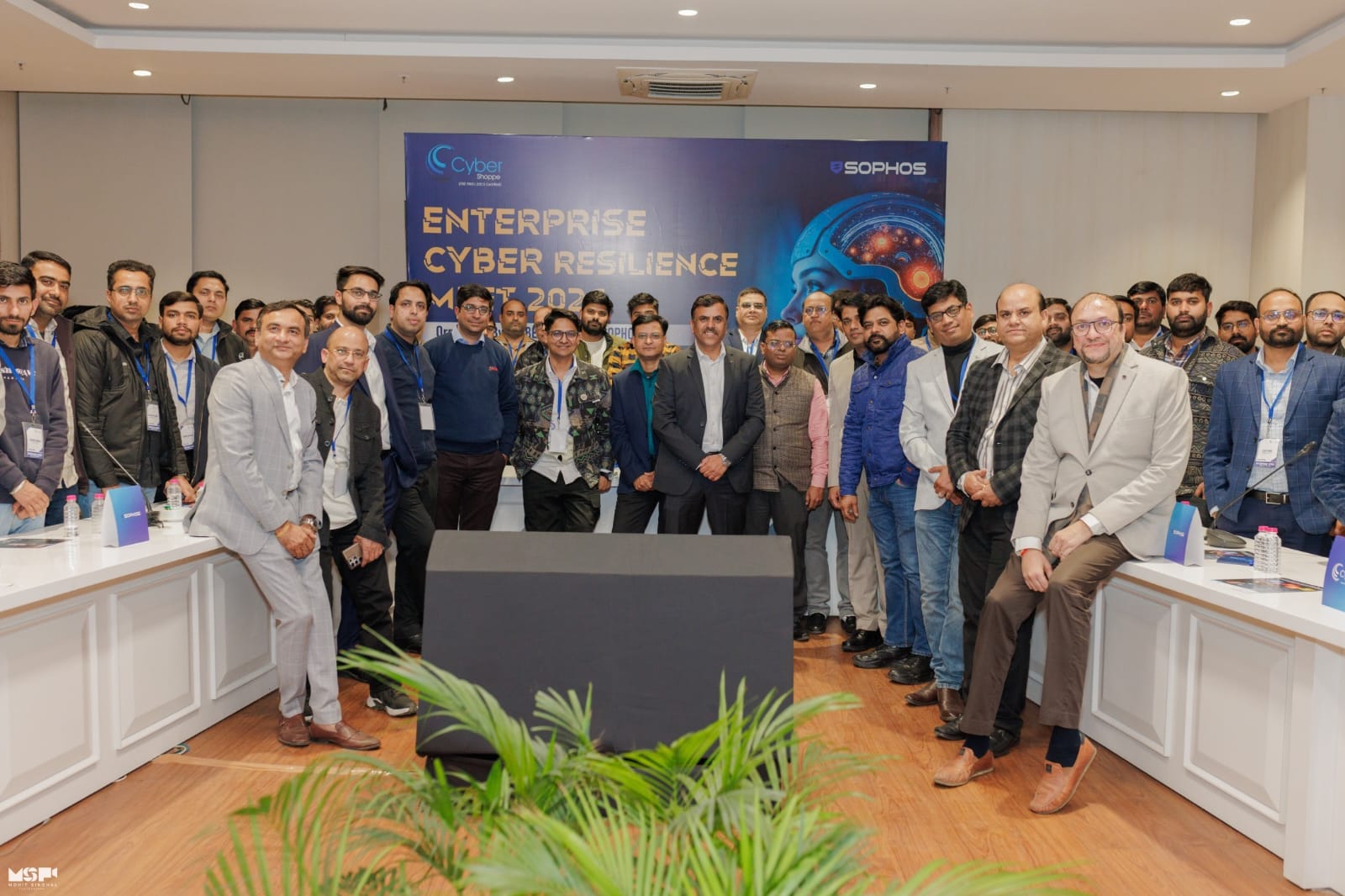 Delegates gathered in front of the Enterprise Cyber Resilience Meet 2026 backdrop at the close of the session.