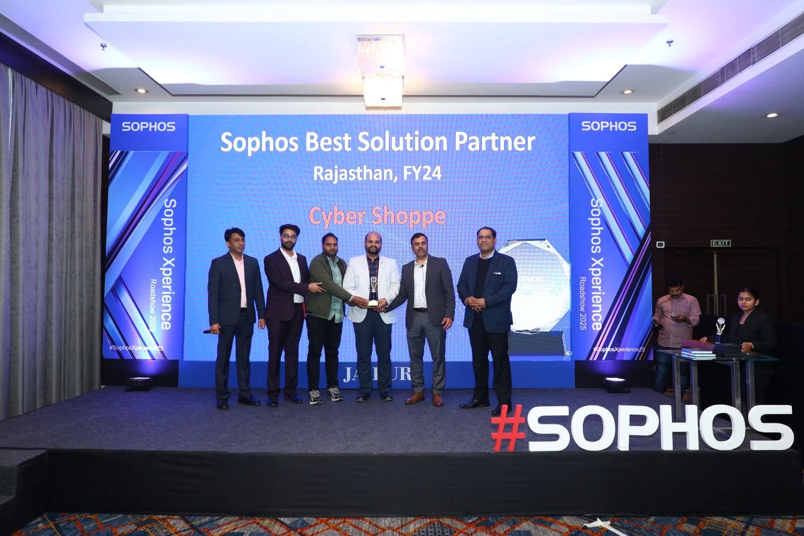 The Cyber Shoppe team receiving the Sophos Best Solution Partner award for Rajasthan, FY24, on stage at the Sophos Xperience Roadshow 2025 in Jaipur.